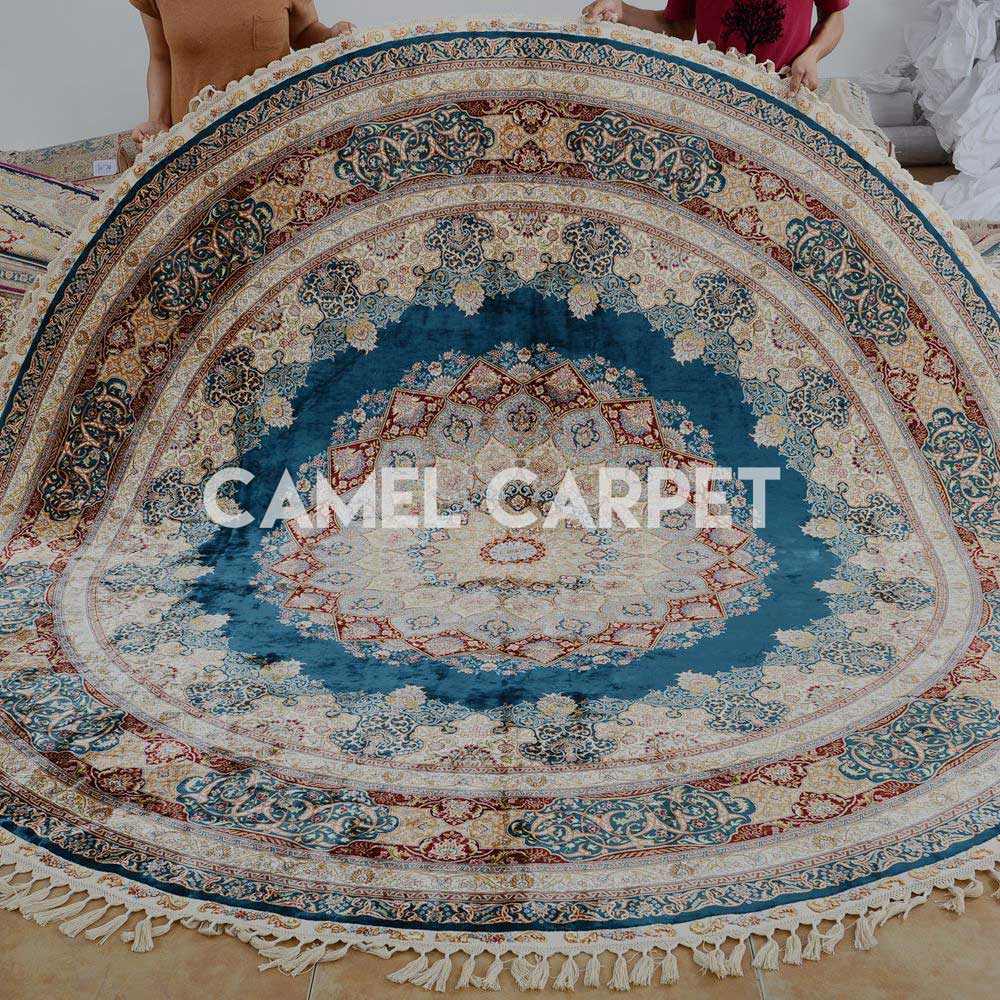 Hand Knotted Silk 9 ft Round Area Rug.jpg